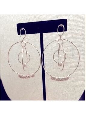 💥 HOT SALE 💥 .925 stamped Sexy & a “Rare Find” Dangling earrings Made in Italy